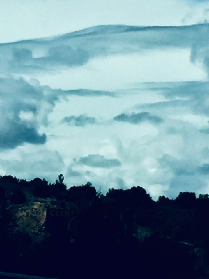 face in clouds