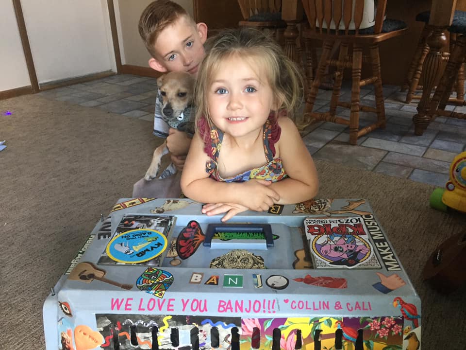 young boy and girl with pet carrier
