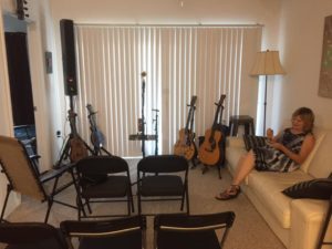 guitars set up in living room
